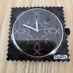S.T.A.M.P.S. Interchangeable watch face with black and purple design